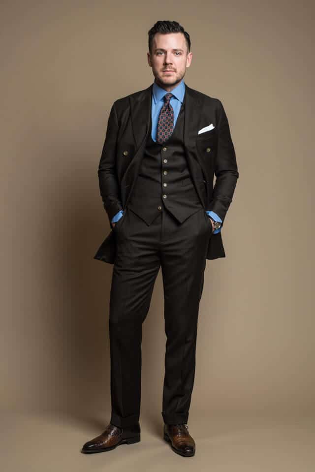 Dan Trepanier - Brown business suit