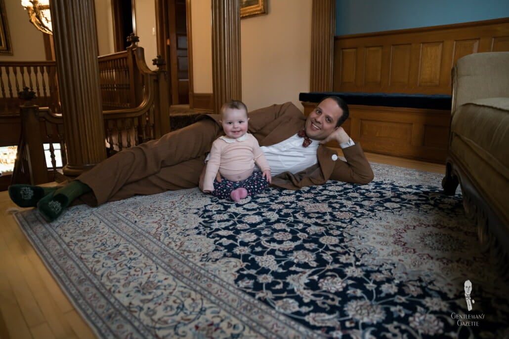 Me playing with my daugther wearing a suit and bow tie