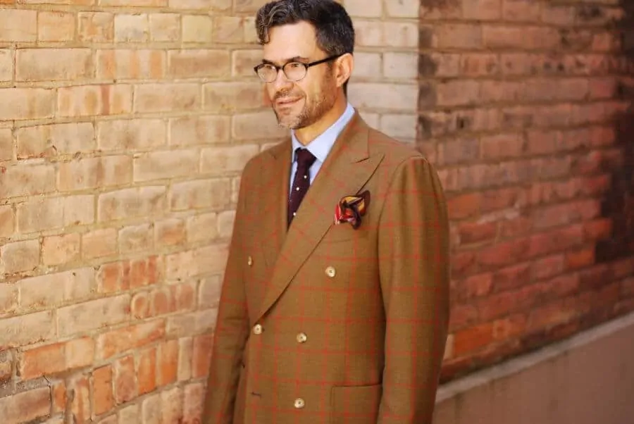 Pedro Mendes with windowpane DB jacket, dotted burgundy knit tie and flamboyant pocket square