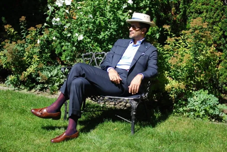 Pedro with grey blue checked suit, shadow stripe socks in red and blue, brown tassels and planter inspired off white hat with folded blue hat band