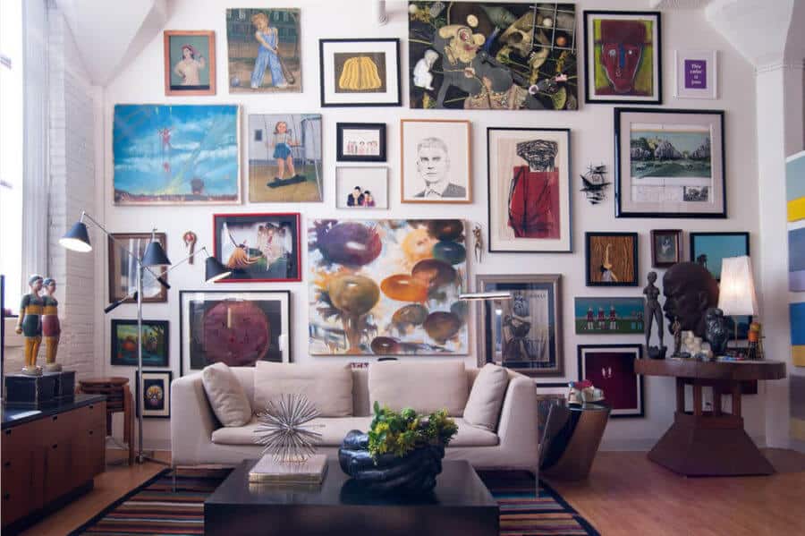 A bold art wall in a sitting room