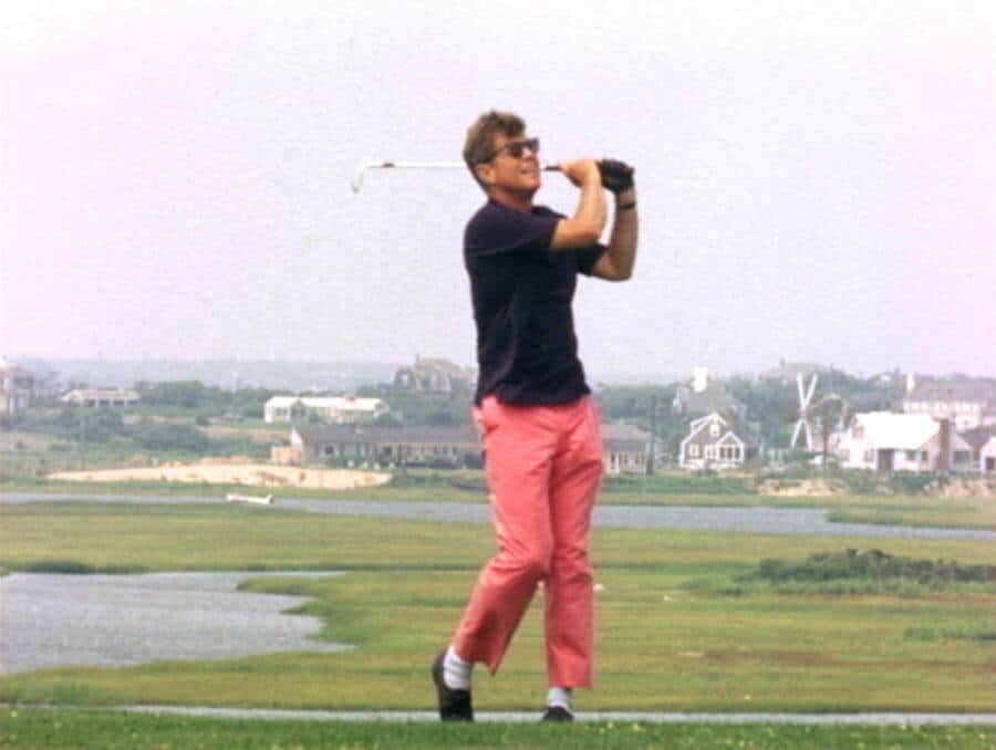 JFK golfing in salmon GTH pants