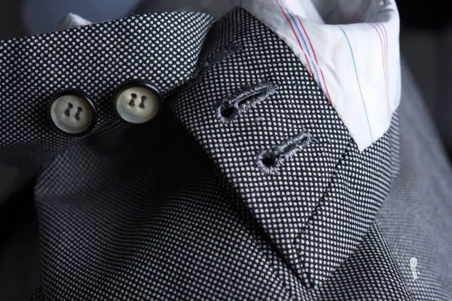 Handmade, neat buttonholes are obligatory on a $5000 bespoke suit