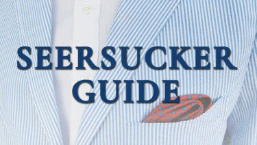 seersucker suit in white & blue stripes, orange micropatterned pocket square, and white dress shirt; text reads "Seersucker Guide"