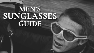 A vintage picture of actor Steve McQueen in sunglasses; text reads "Men's Sunglasses Guide"