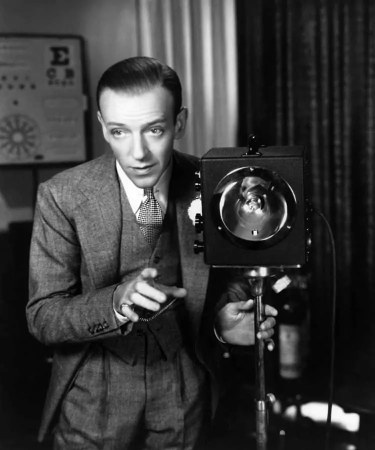 Fred Astaire with collar pin but no tie bar when he wears a three piece suit or vest