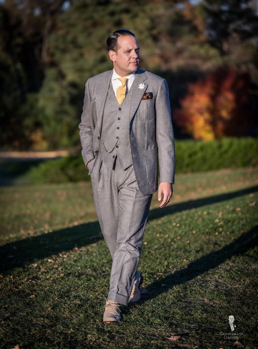 Allen Edmonds chukka boots in sand paired with houndstooth flannel 3-piece suit