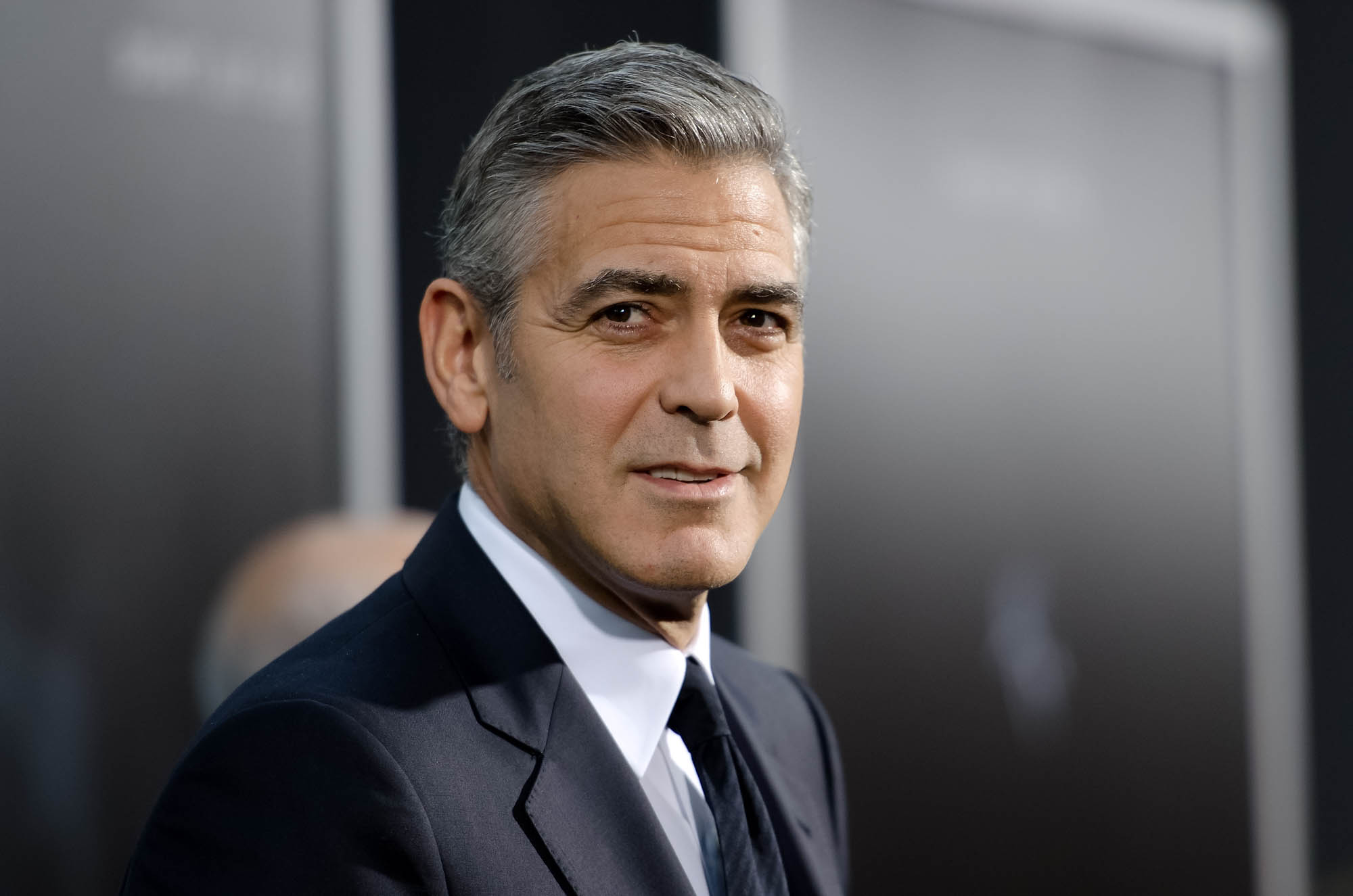 George Clooney happy to look his age with salt and pepper hair
