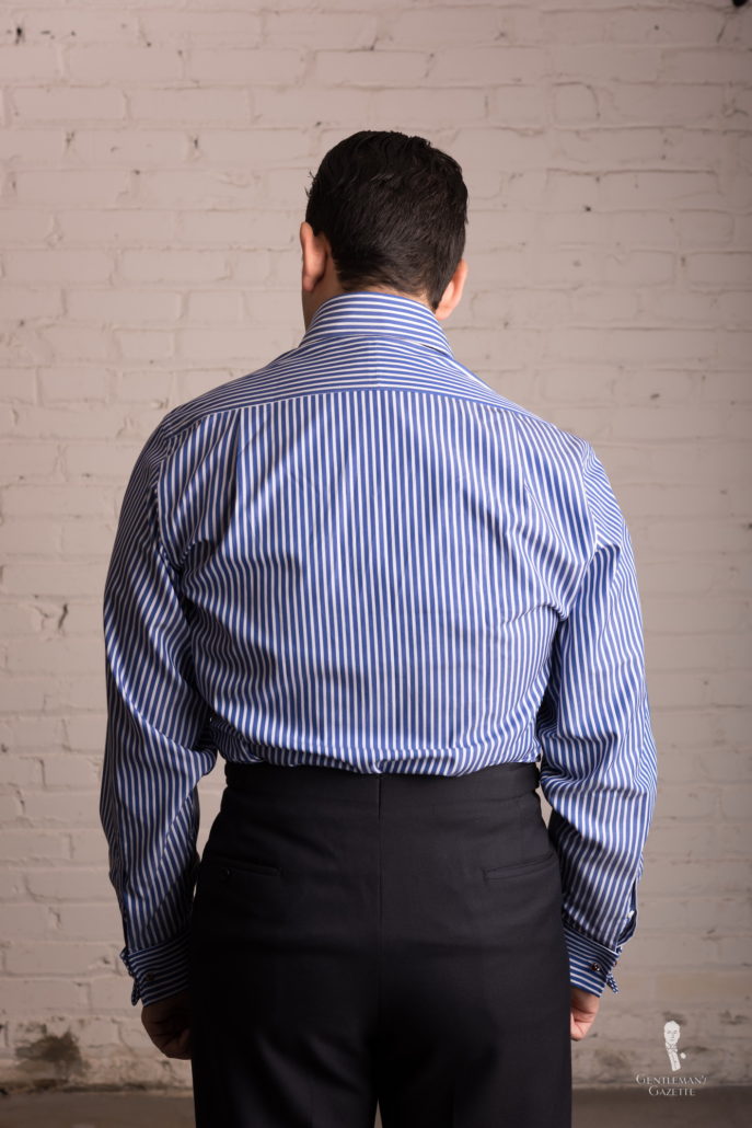 Back view of striped Deo Veritas shirt