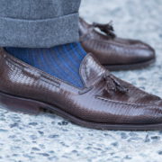 Brown Lizard Tassel Loafers with dark blue and royal blue shadow stripe socks and grey flannel