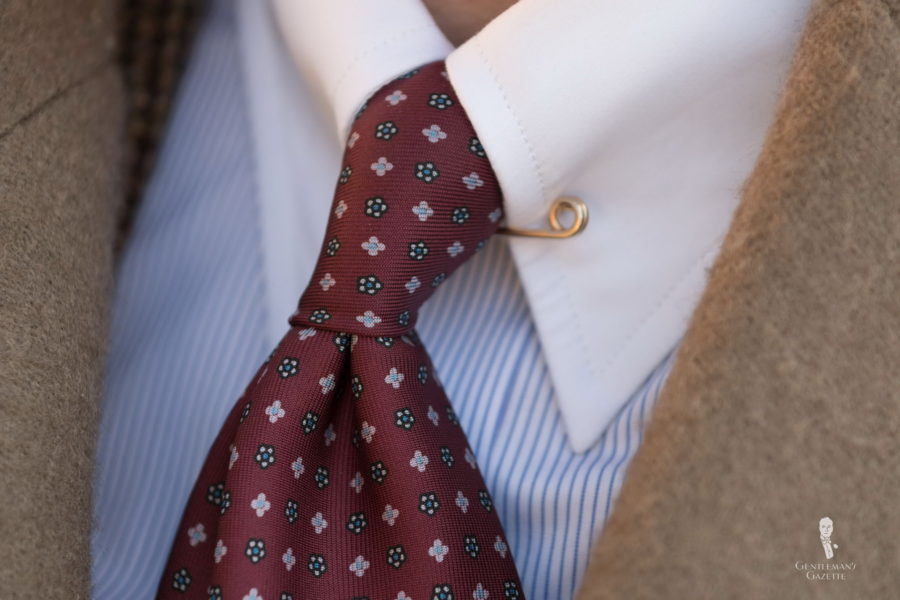 Wearing a collar pin is something you should consider if you want the classic look