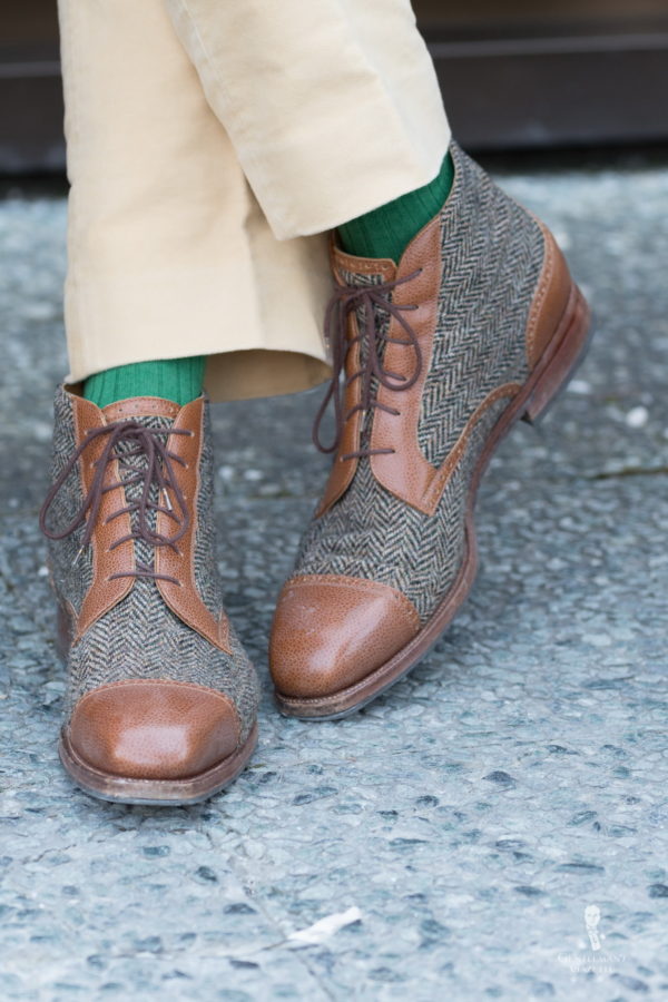 Grimod with tweed boots, green socks and khaki pants