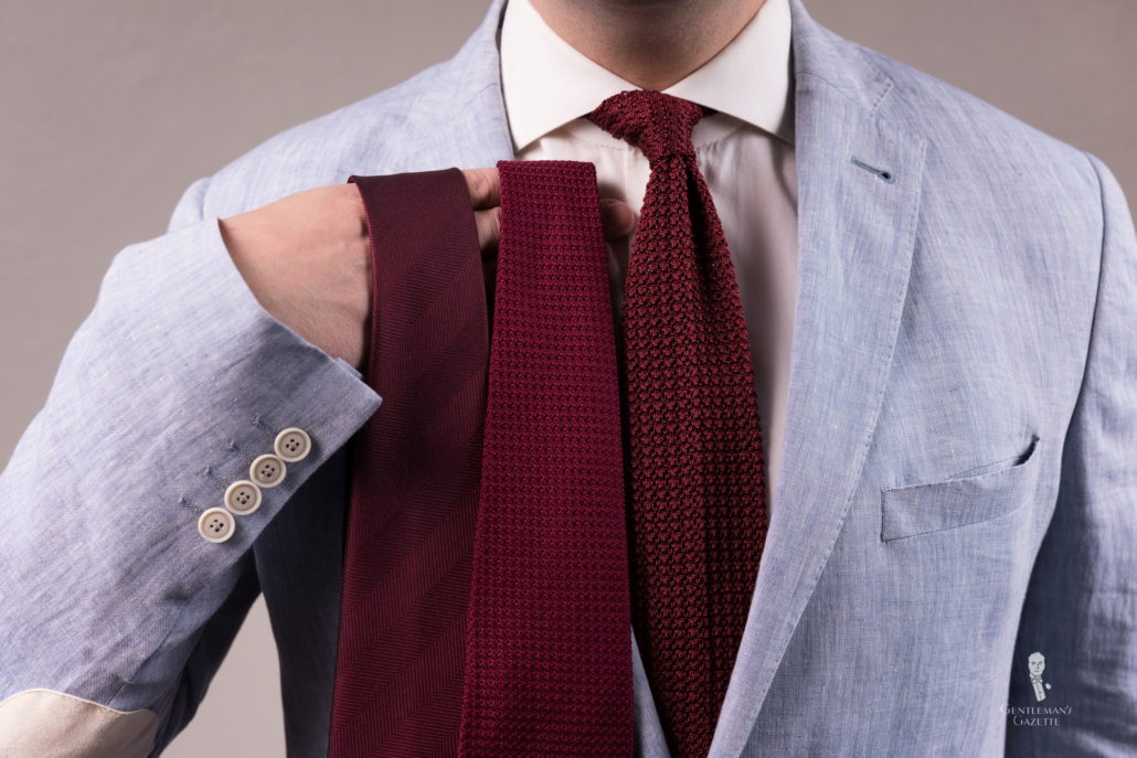 assorted burgundy ties