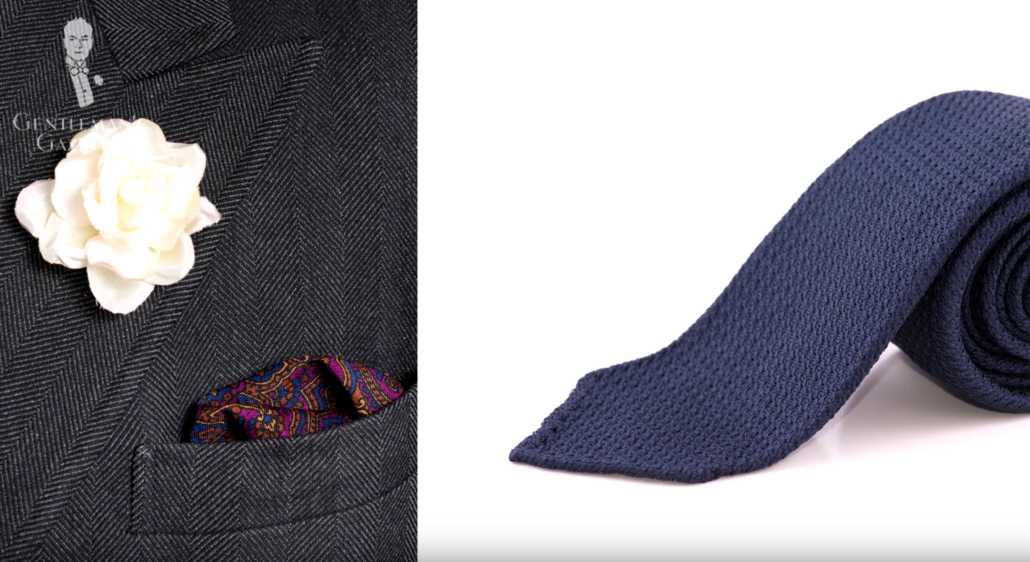 Charcoal is the better black - Paisley Motif Pocket Square, Ivory Spray Rose Boutonniere and Grenadine Silk Tie in Navy Blue from Fort Belvedere