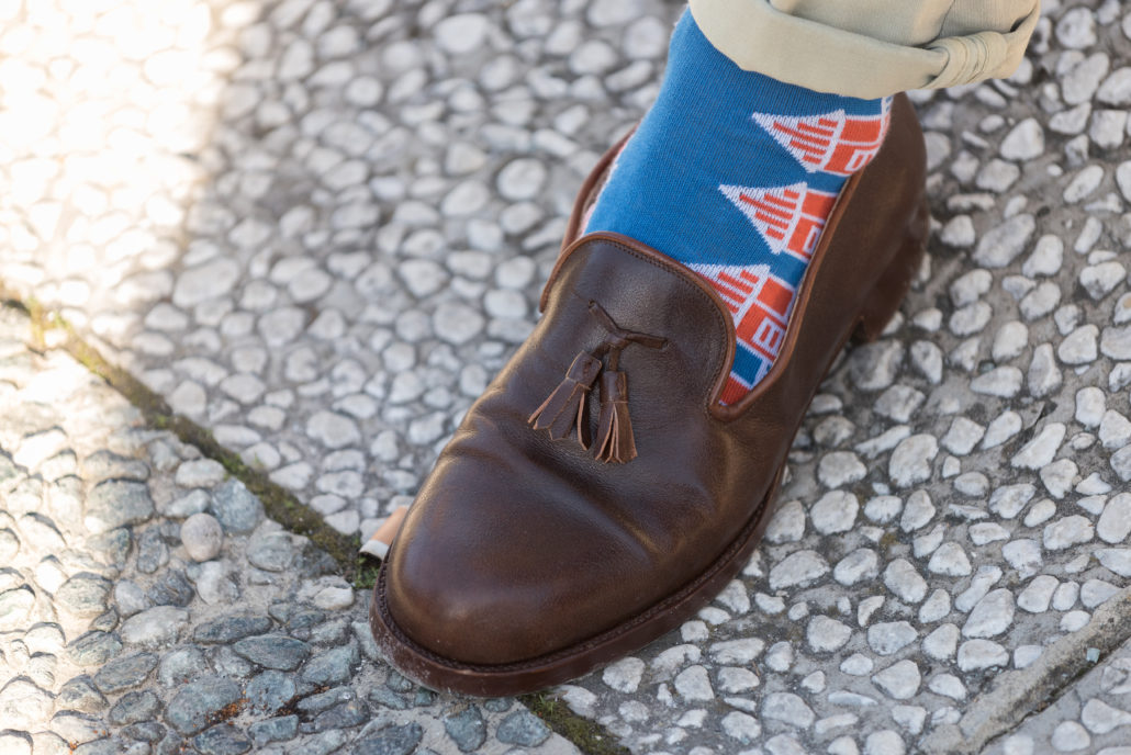 Crazy socks with pinrolled chinos to show them off even more