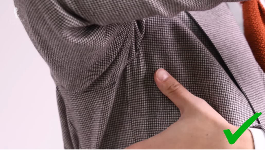 A good armhole fit allows a good range of motion--such as waving