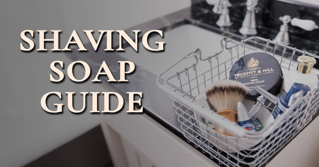 A metal basket of shaving supplies, with a shaving soap highlighted, sits atop a bathroom vanity; text reads, "Shaving Soap Guide"