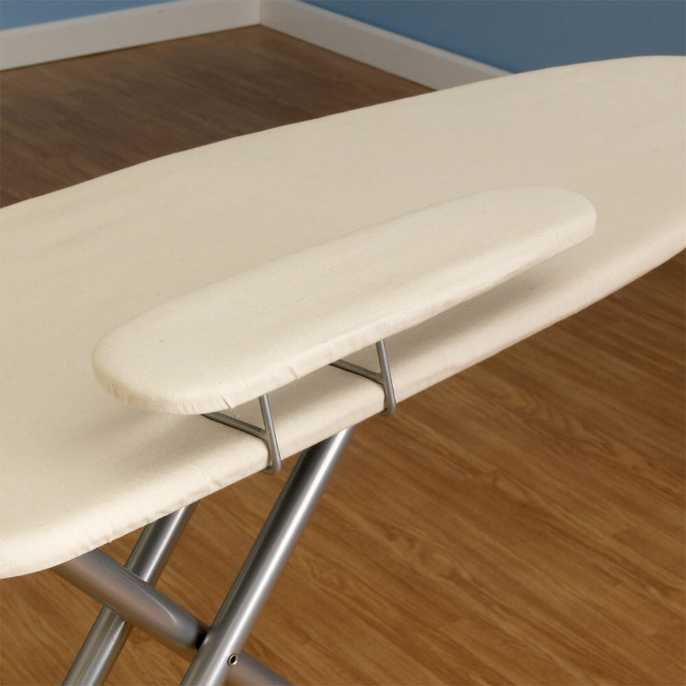 A spacious ironing board with attached sleeve board