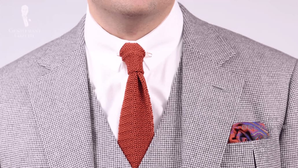 Houndstooth flannel with solid red knit tie and Orange, Green, Blue, Yellow, Silk Wool Medallion Pocket Square by Fort Belvedere