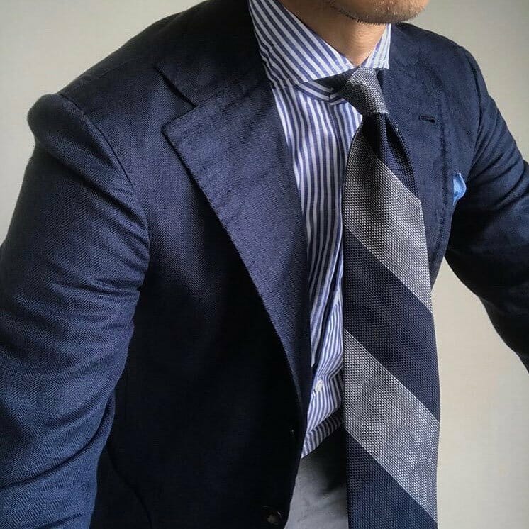 @nfld_rm55 wearing a blue and gray block stripe tie.