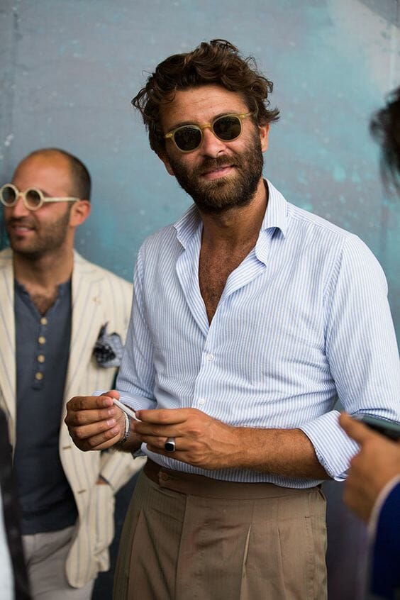 Pleated trousers and a shirt with no jacket at Pitti Uomo