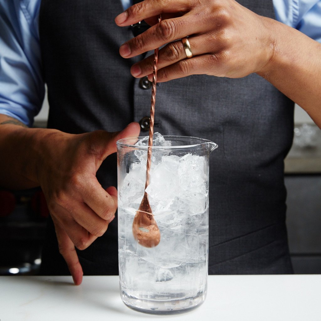 Bartender stirring a Dry Martini