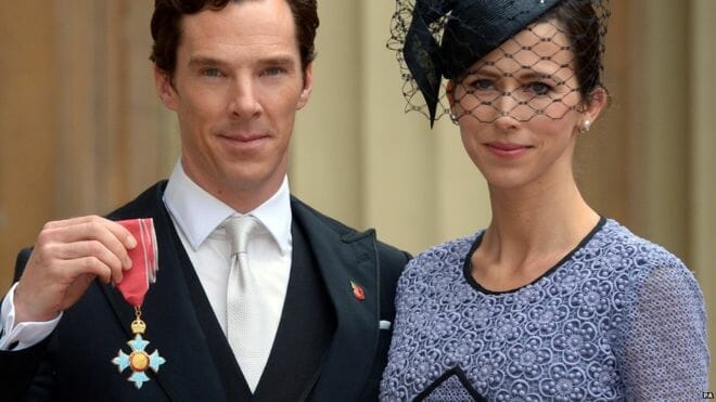 Benedict Cumberbatch (with CBE cross on hand) and wife Sophie Hunter