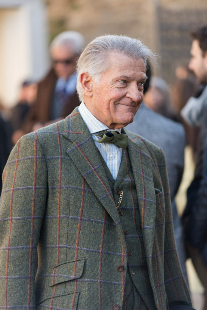 Gingham shirt worn with a windowpane suit containing lines of different colors.