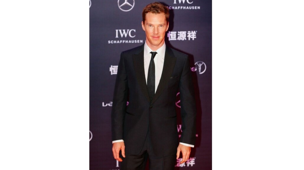 Benedict Cumberbatch in black suit and necktie with white shirt