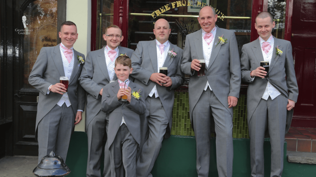 Wedding entourage in light pink formal ascots