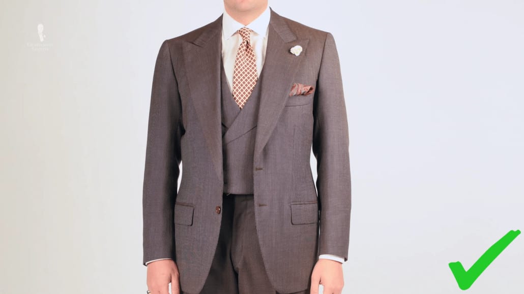 3 piece single breasted suit in brown worn with Fort Belvedere accessories