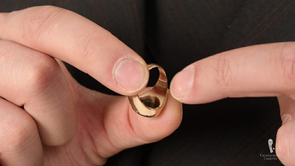 A photo of a ring with an open setting