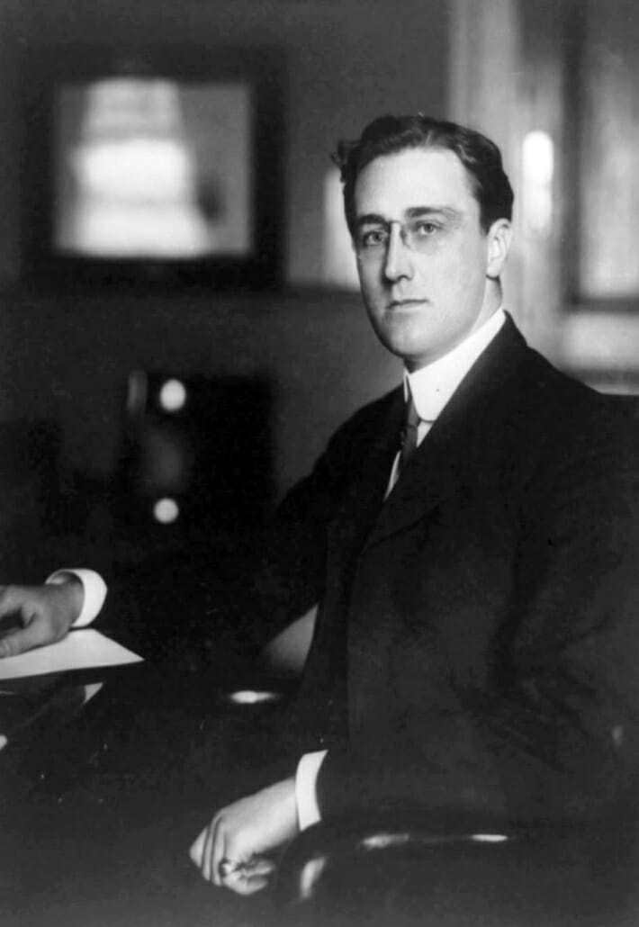 Young FDR with stacked wedding band and pinky ring