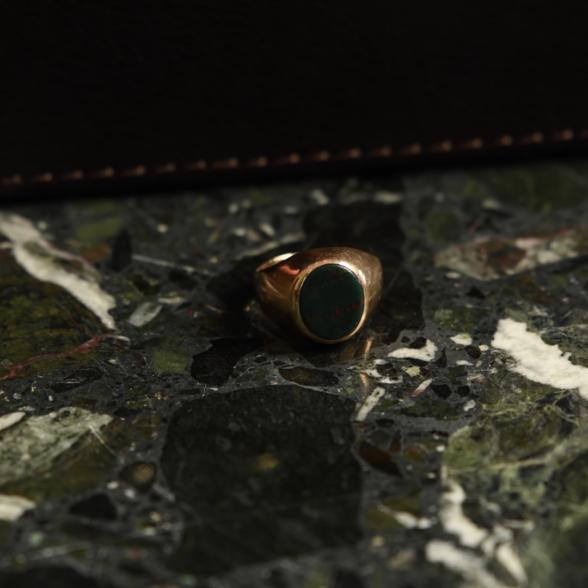 A photograph of a bloodstone ring