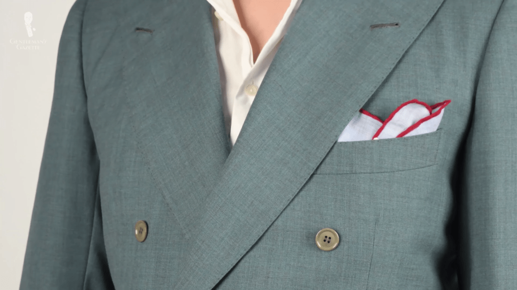 Light blue pocket square with red edges