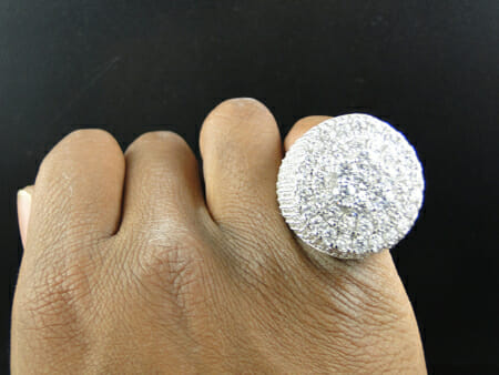 A photo of an Oversized pinky ring that looks rather cheap