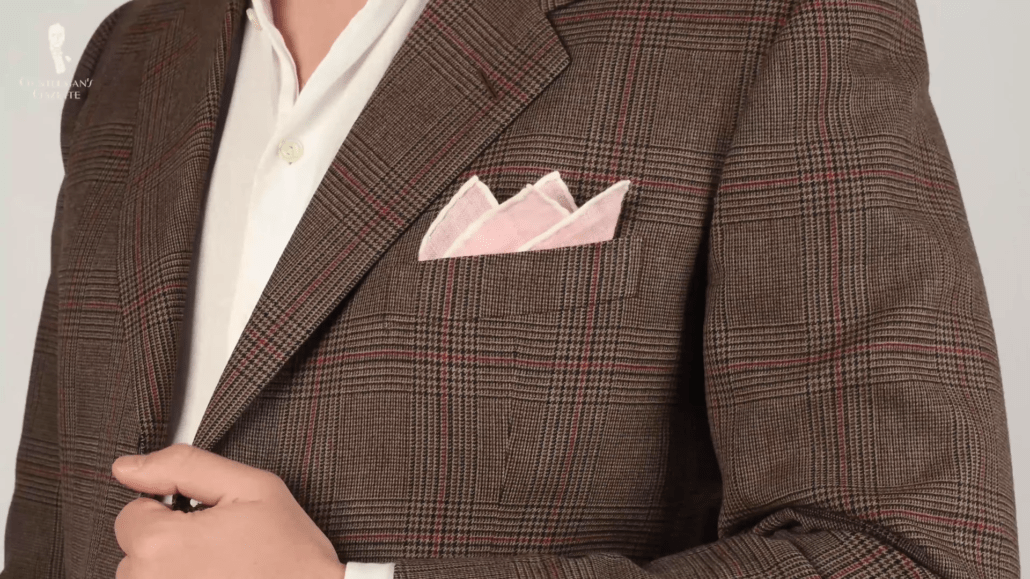 Pink pocket square with white contrast edge