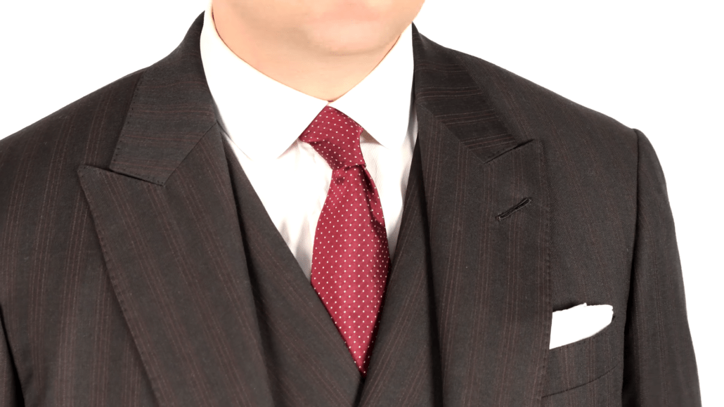 Faint stripe suit dotted tie and white linen pocket square