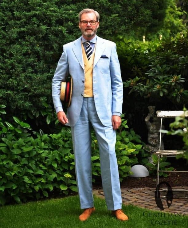 This sky blue linen suit has a looser fit that is still crisp and flattering