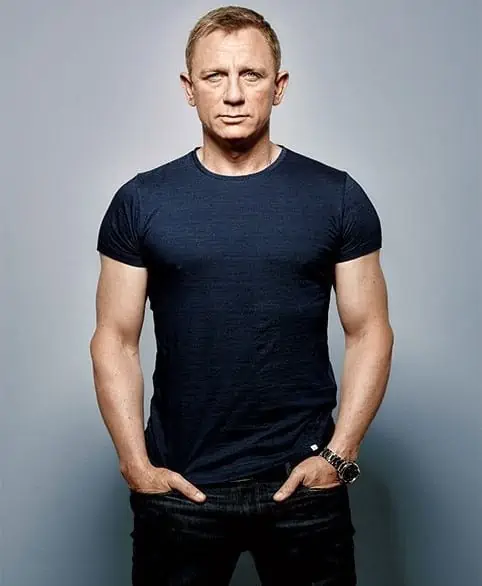Daniel Craig wearing a black t-shirt and jeans