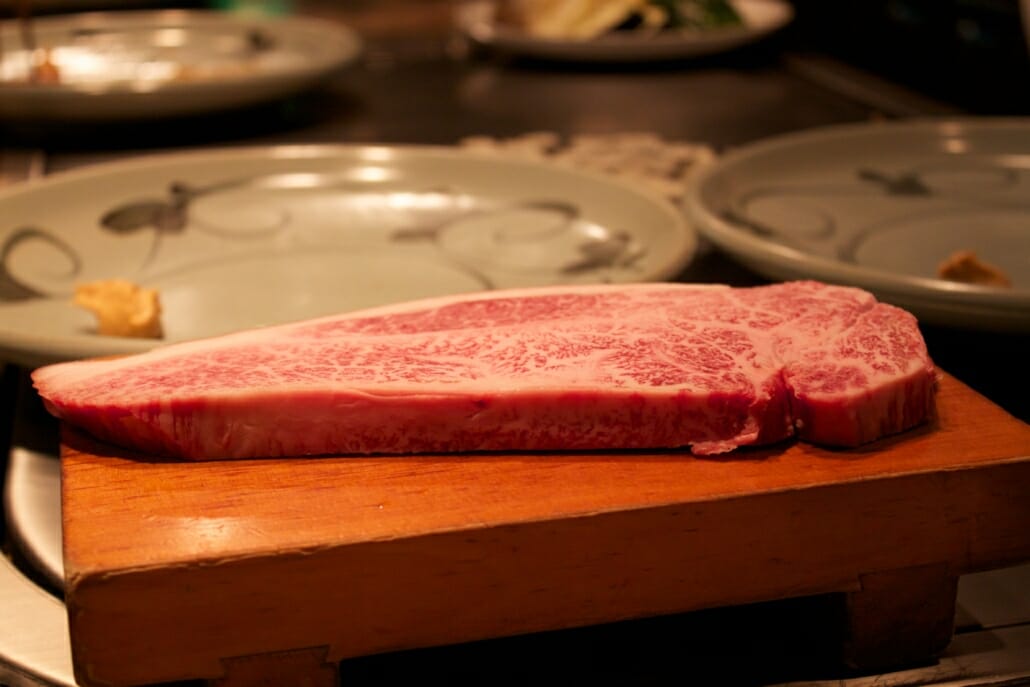 A cut of beef such as the one pictured here, with little connective tissue and finely marbled fat, will be more tender and flavorful.