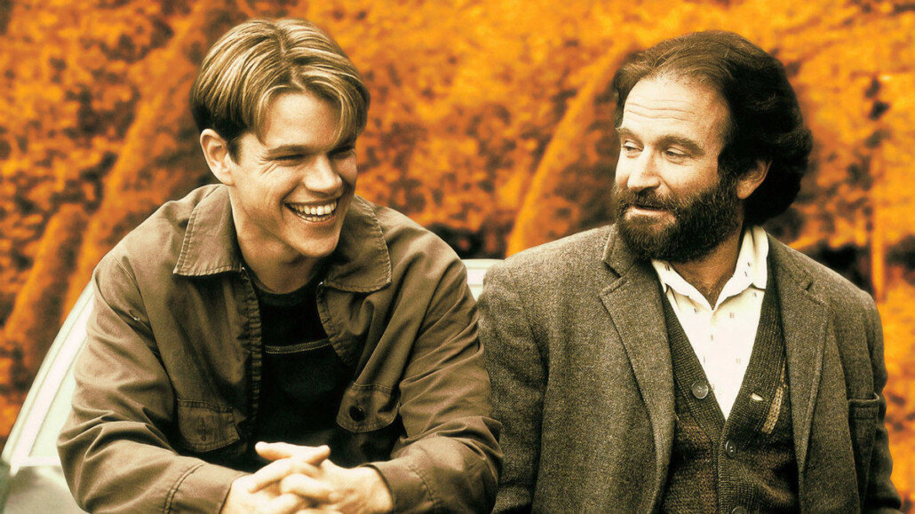 In Good Will Hunting, Sean McGuire (Robin Williams) wears a tweed jacket with a casual cardigan and no tie