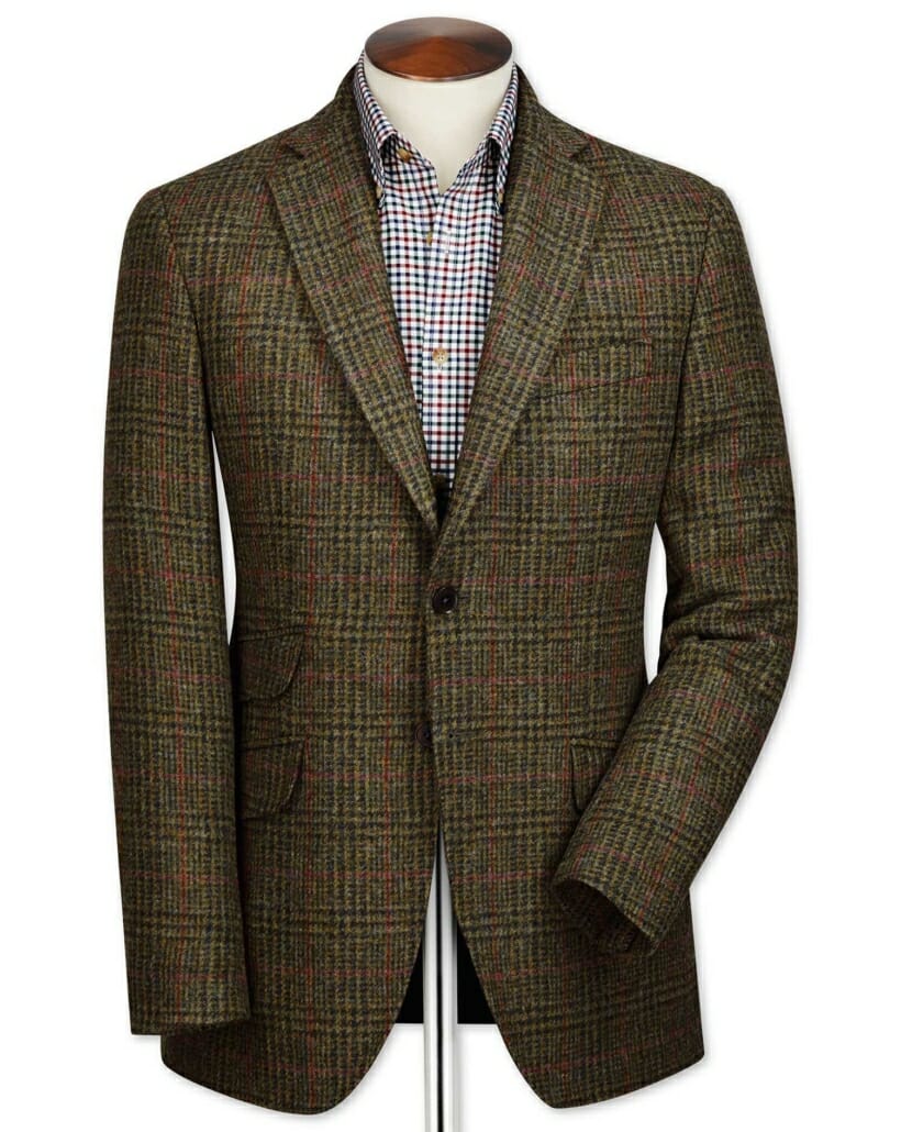 A British tweed jacket, featuring angled flap pockets (and a ticket pocket).