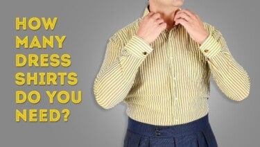 Raphael wearing a stripe dress shirt in yellow and gray, and Eagle Claw Cufflinks with Tiger's Eye Balls