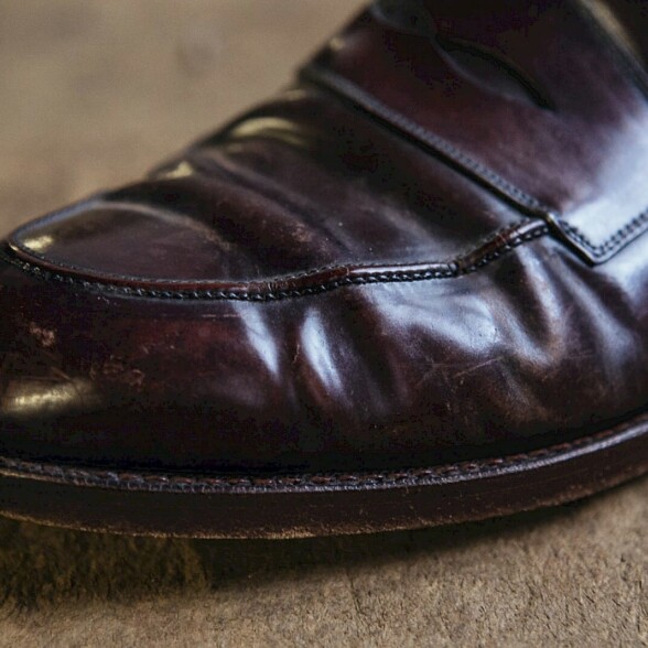 A cordovan leather loafer with significant rippling