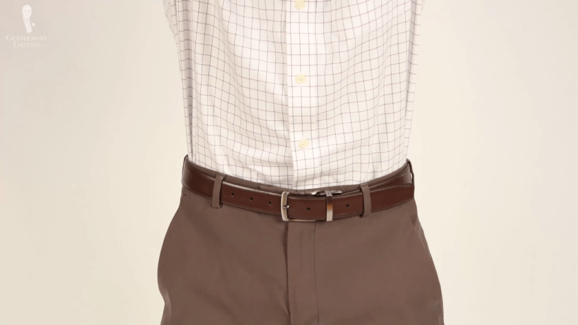 A photograph of a tucked-in shirt