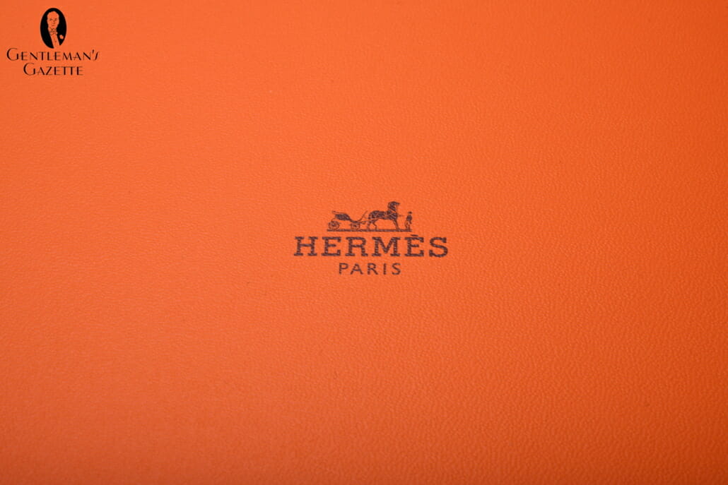 Logo of orange Hermes tie box