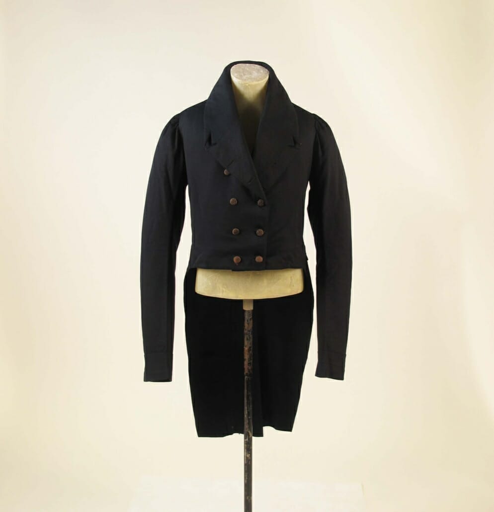An example of a dark wool tailcoat with pronounced cutaway front, c. 1815.
