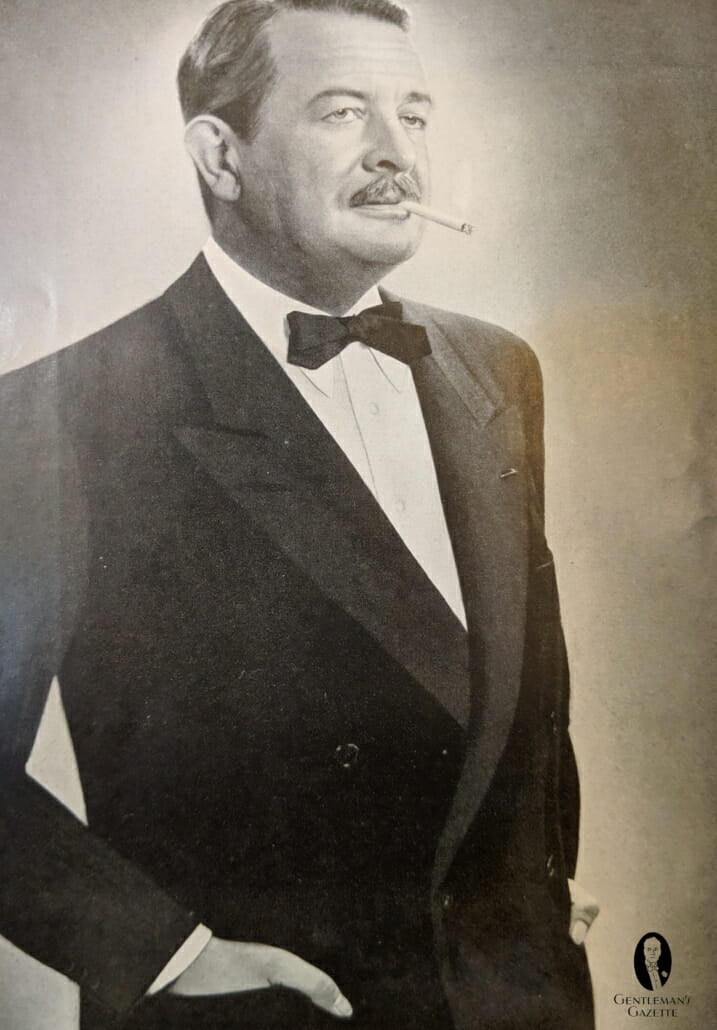 1950s Tuxedo - often double breasted with turndown collar and thinner bow tie, here with pointed ends of course the cigarette is a must
