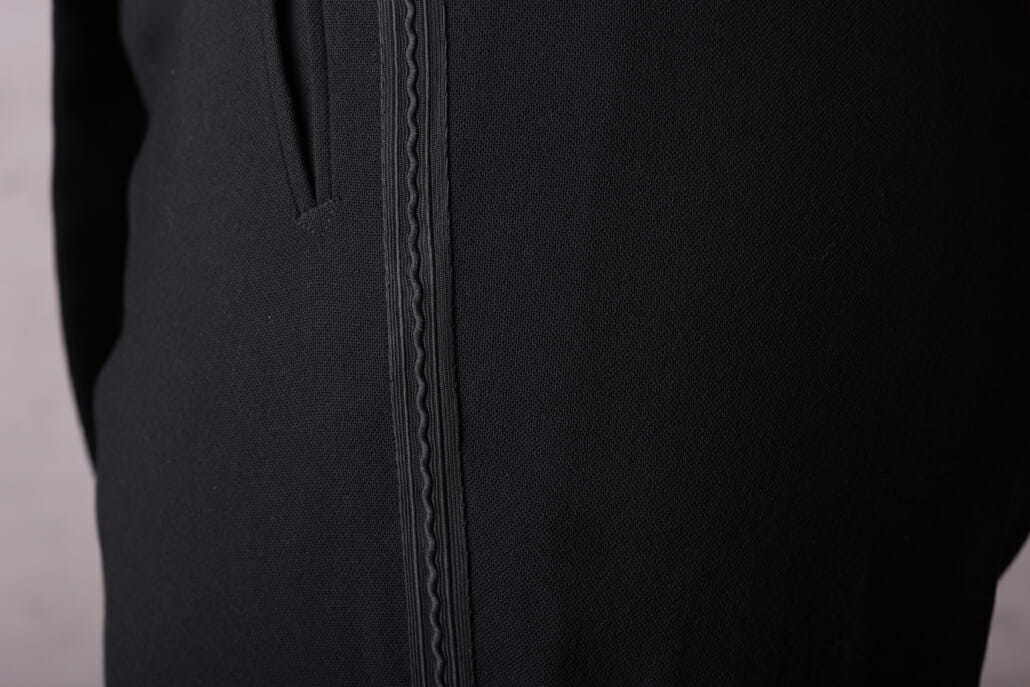 Side braid along the pants of an evening black tie tuxedo ensemble
